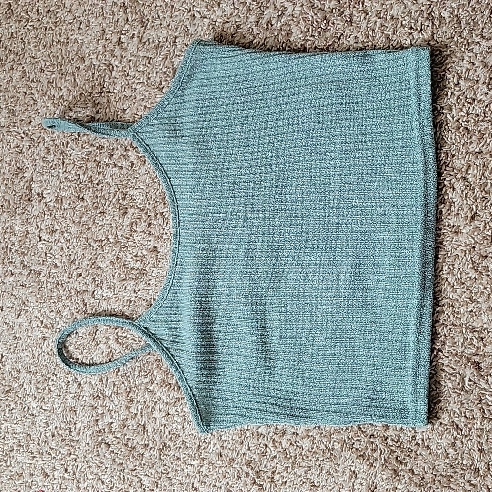 Green sweater-material crop top with spaghetti straps